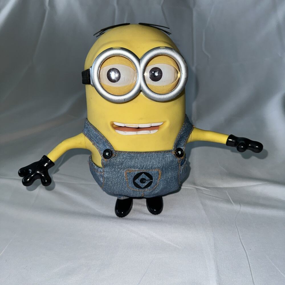 ￼ Battery Control Minion 9 Inches High 5 Inches Wide, Dances And Talks￼